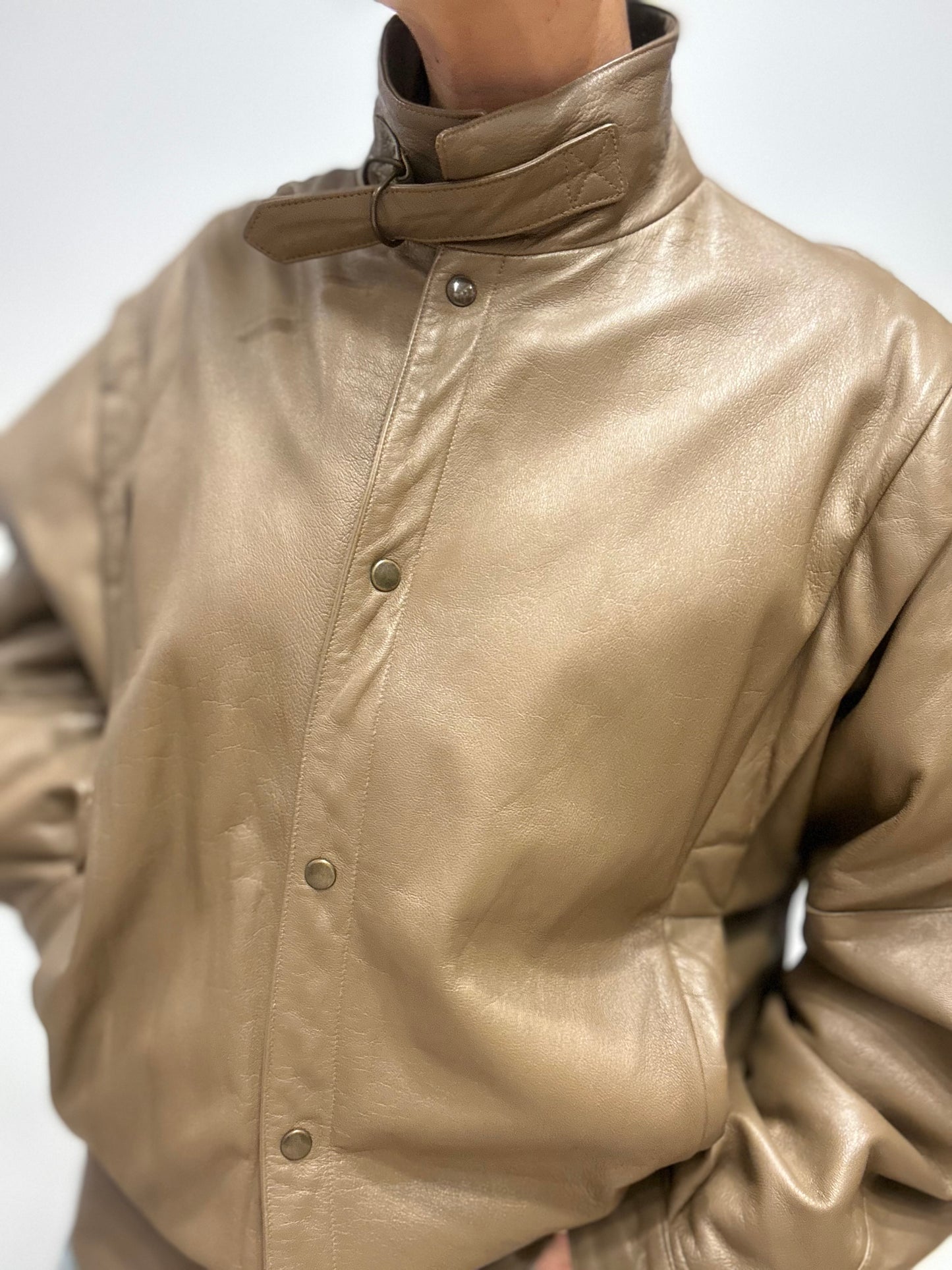 Vintage leren bomberjas in zand-beige tint