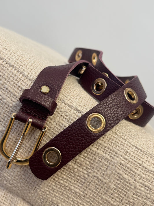 Burgundy eyelet belt with gold